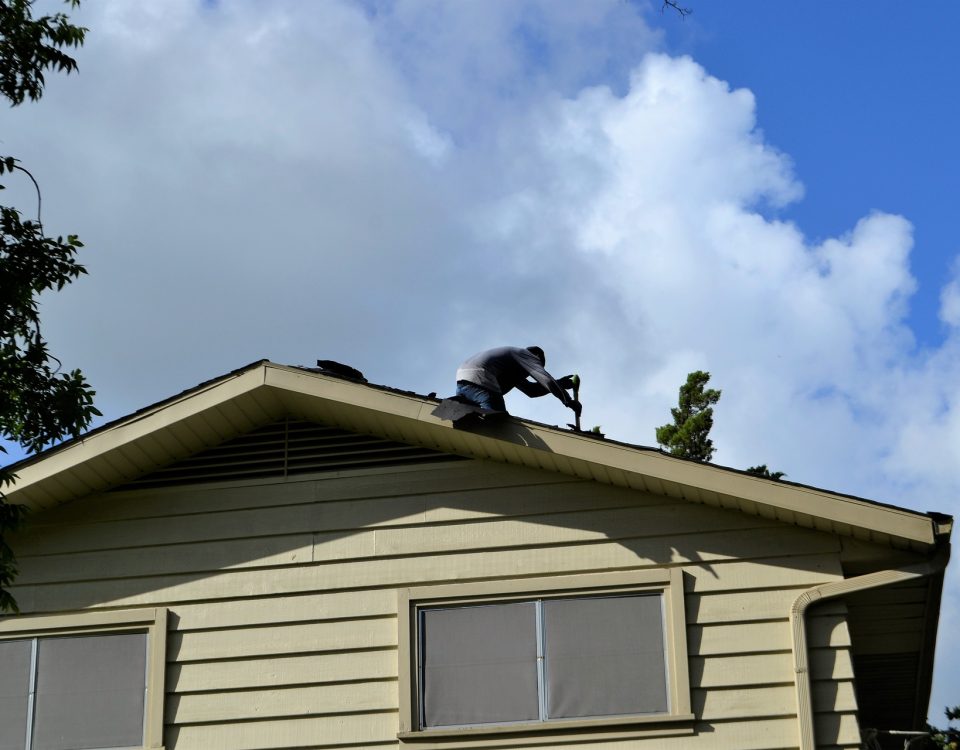 roofing contractor on a roof